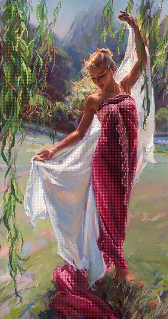 Woman in a red dress with a white scarf by a river with willow trees