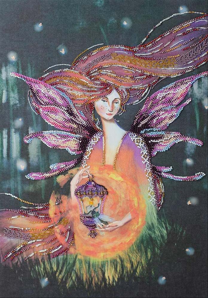 Colorful fairy with wings holding a lantern in a dark forest setting