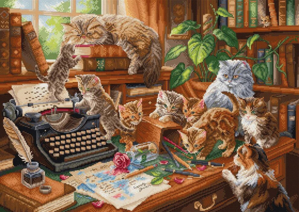 A detailed needlepoint or cross-stitch style artwork depicting several cats in a cozy study with bookshelves, a typewriter, papers, and plants. The scene is filled with warm browns, creams, and green tones, with multiple cat breeds visible.