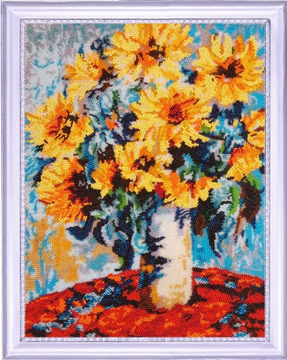 Cross-stitched sunflowers in a vase on a colorful background