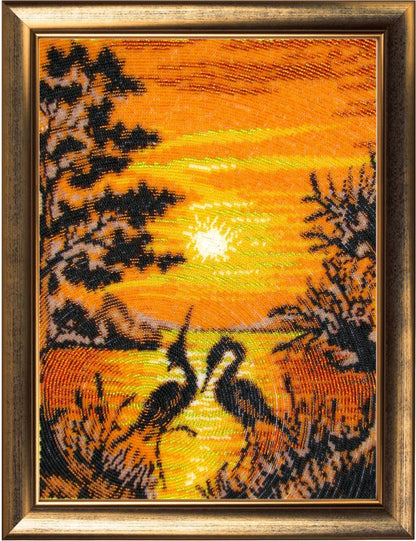 Bead embroidery kit depicting cranes in a sunset landscape, frame not included.