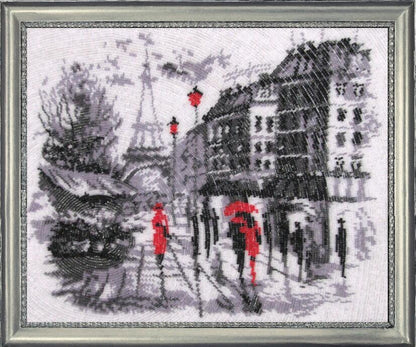 A bead embroidery kit depicting a city scene with people, buildings, and a printed pattern, framed (frame not included).