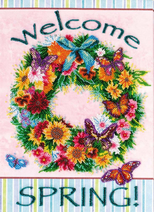 Decorative card with a colorful wreath of flowers and butterflies, and the text 'Welcome Spring!' on a striped background.