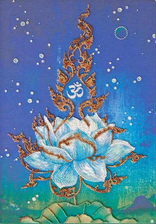 Decorative design of a blue lotus flower with gold accents and an 'Om' symbol on a blue background.