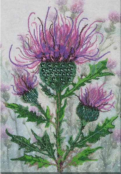 Abris Art bead embroidery kit featuring a completed "Thistle Flower" (Spiky Luxury) design. The colorful purple and pink thistle flowers and green leaves are fully embroidered with shimmering Czech glass beads on a natural art canvas. The background shows a soft, artistic painting of a misty field. Vertical layout, size 35x25 cm.