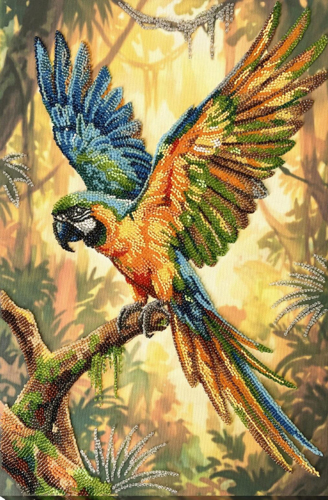 A colorful diamond painting or cross-stitch style artwork of a macaw parrot perched on a branch in a jungle scene, with blue, green, orange, yellow, and brown tones.