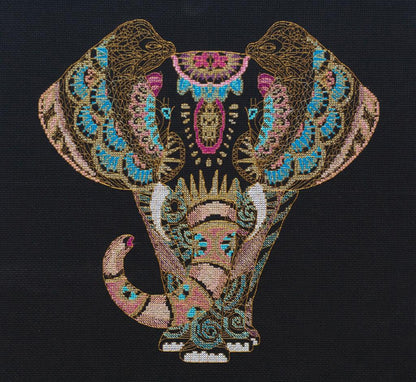 Cross stitch kit depicting a detailed and colorful elephant design on a black background