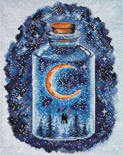 A cross stitch kit depicting a crescent moon inside a glass bottle with a night sky and trees outside the bottle.