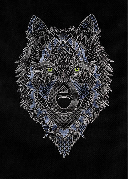 A cross stitch kit depicting a detailed silver wolf on a black background, with intricate patterns filling the wolf's outline.