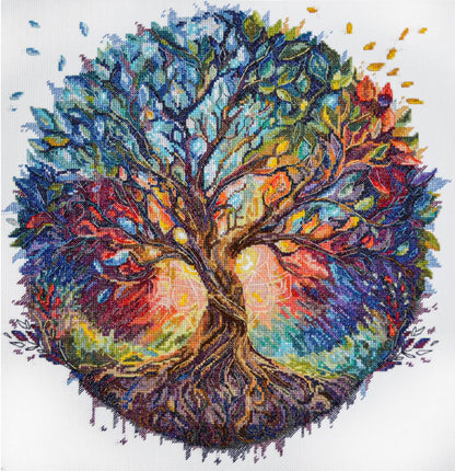 A cross stitch kit depicting a colorful tree with roots extending into a geometric, multicolored background.