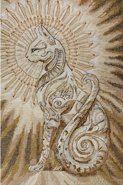 Cross stitch kit depicting a stylized cat with sun rays in the background, using beige and brown threads on a beige canvas.