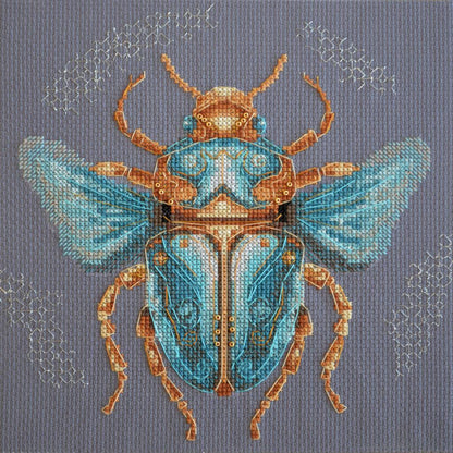 A cross stitch kit depicting a colorful insect,