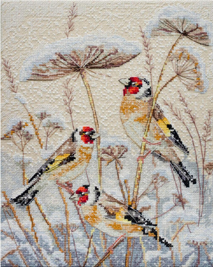 A cross stitch kit depicting two swans among plant stalks, with detailed feather patterns and natural colors.