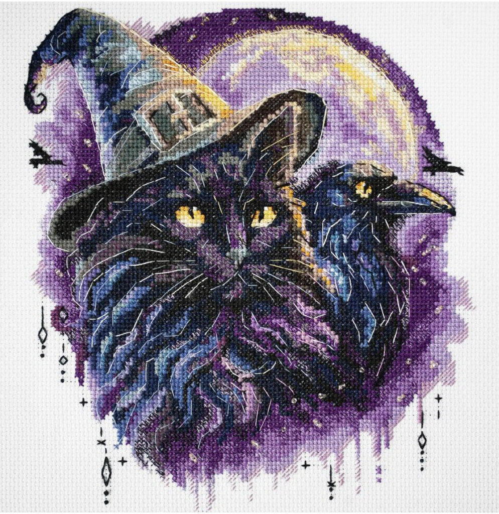 Cross-stitched design of a black cat wearing a witch hat with a raven on a purple background.