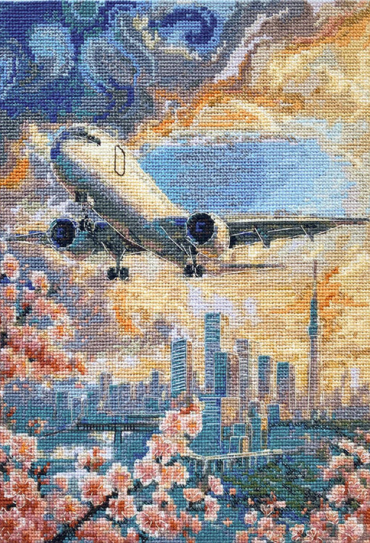 Painting of an airplane flying over a cityscape with cherry blossoms