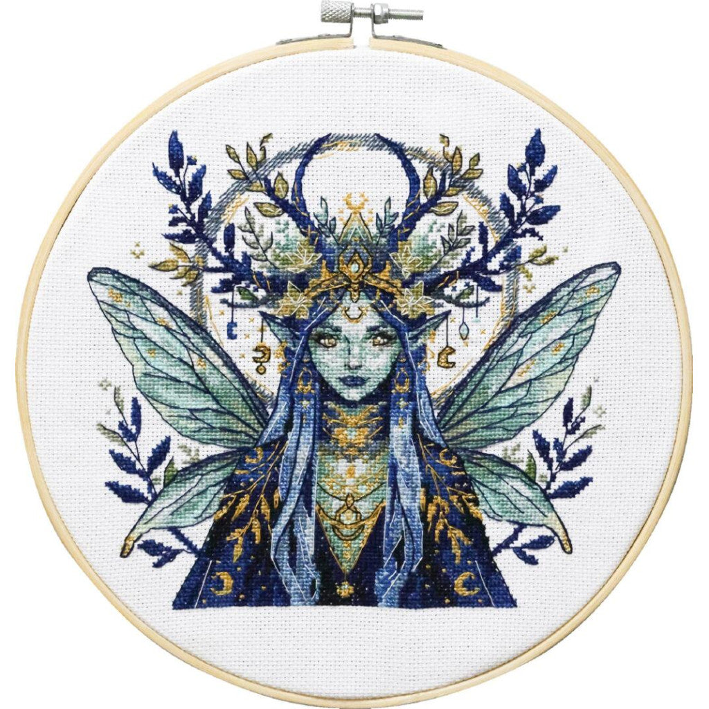 Embroidery hoop with a fairy design featuring wings and antlers on a white background
