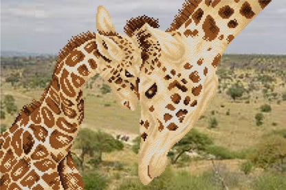 A photo of a bead embroidery kit depicting two giraffes in a savannah setting.