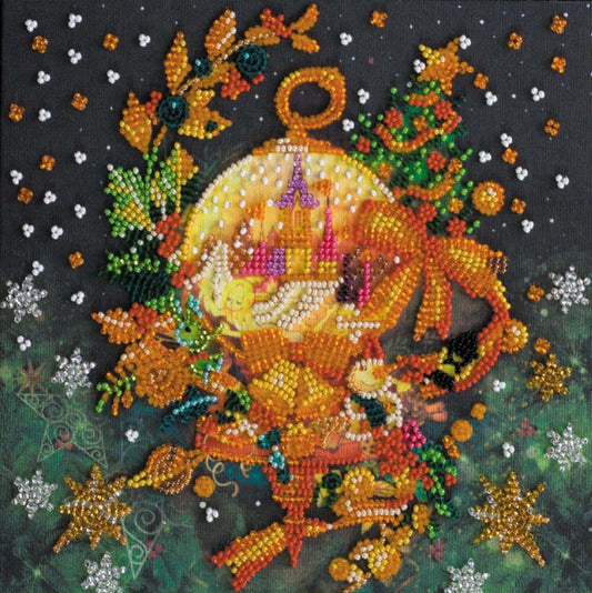 Decorative beadwork piece with a central circular design surrounded by festive elements on a dark background.