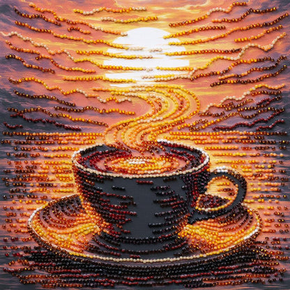 Artistic depiction of a coffee cup and saucer made from small beads or stones, set against a warm, glowing background.