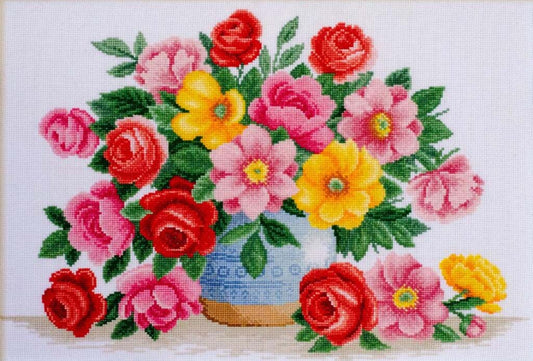 Cross-stitched pattern of a bouquet of flowers with red, pink, and yellow roses on a white background.