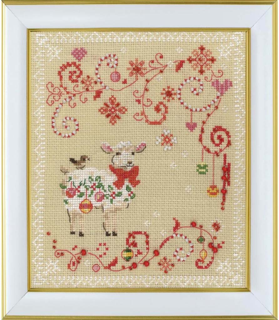 Decorative cross-stitch pattern with reindeer and festive elements on a beige background.