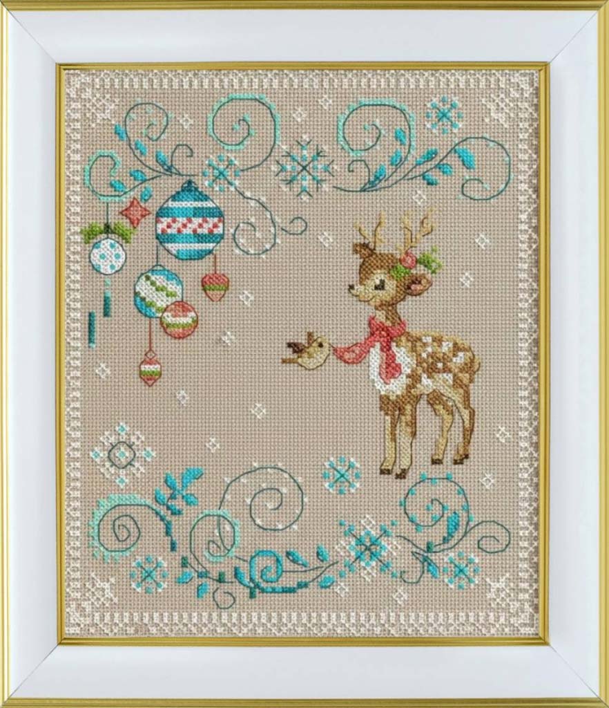 Cross-stitched design of a deer holding a bird with decorative elements on a beige background.