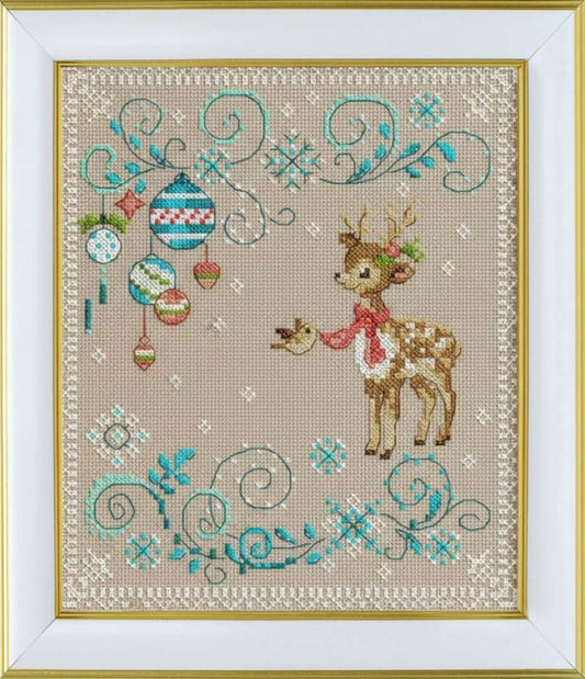 Cross-stitched design of a deer holding a bird with decorative elements on a beige background.