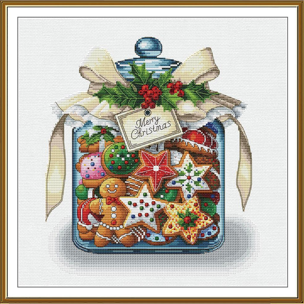 A framed Christmas-themed cross-stitch or needlework-style illustration showing a glass jar filled with gingerbread cookies, decorated with a cream ribbon, green holly, red berries, and a hanging tag that reads “Merry Christmas.”.