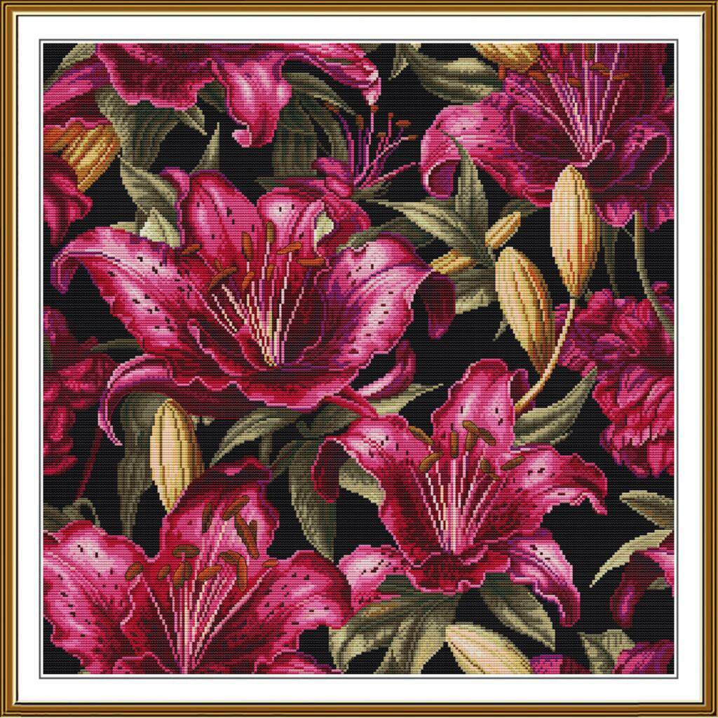 A framed floral artwork featuring large pink lily flowers with green leaves and beige buds on a black background, surrounded by a white mat and gold frame.