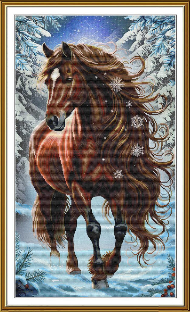 A framed needlepoint or cross-stitch style artwork showing a brown horse galloping through a snowy winter landscape with snowflakes and a blue starry sky.