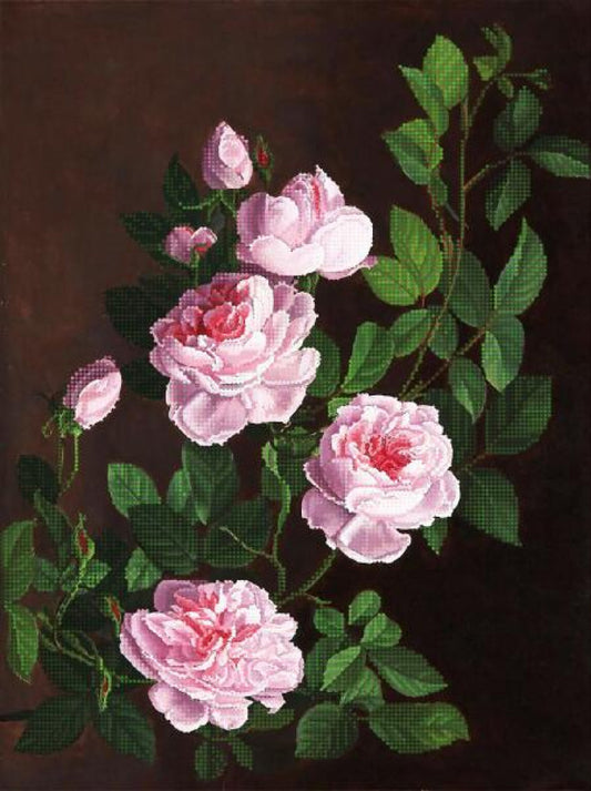 Embroidered design of pink roses with green leaves on a dark background
