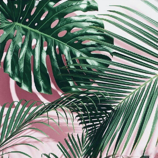 Close-up of tropical leaves with a pink and white abstract background